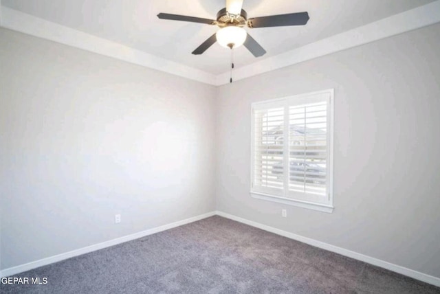 unfurnished room with a ceiling fan, carpet flooring, and baseboards