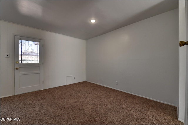 carpeted spare room with recessed lighting