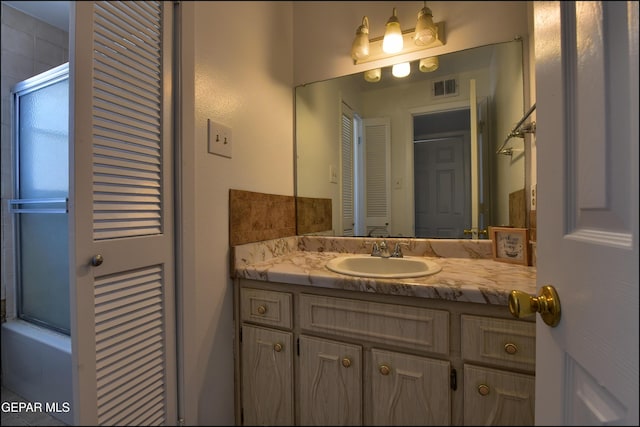 bathroom featuring visible vents and vanity