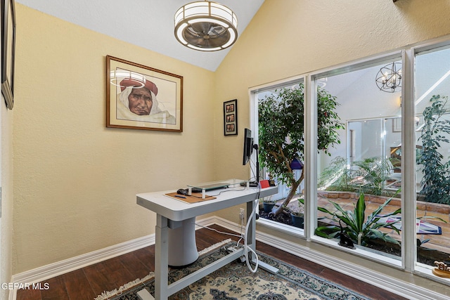 5673 Upper Valley Rd, El Paso, TX 79932 - office area with a textured wall, vaulted ceiling, wood finished floors, and baseboards