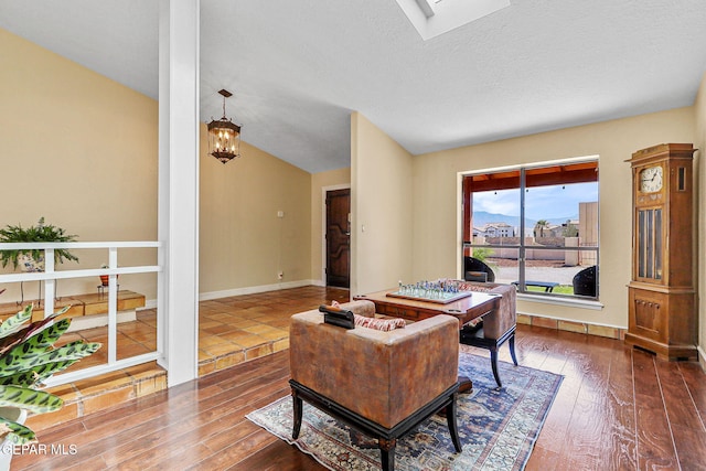 5673 Upper Valley Rd, El Paso, TX 79932 - office area with a skylight, hardwood / wood-style flooring, and baseboards