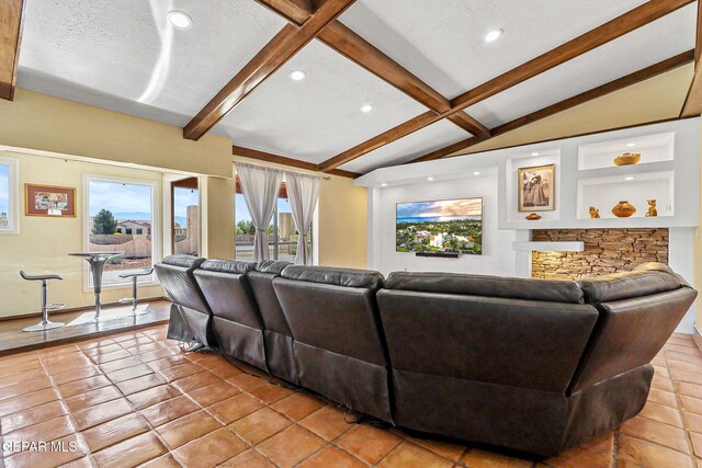 5673 Upper Valley Rd, El Paso, TX 79932 - living room featuring recessed lighting, light tile patterned flooring, and vaulted ceiling with beams
