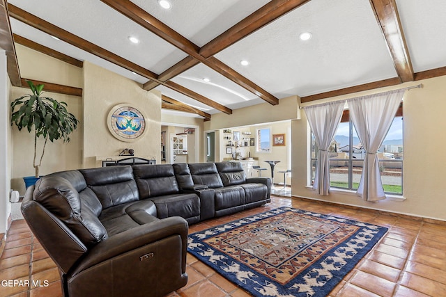 5673 Upper Valley Rd, El Paso, TX 79932 - living area with beam ceiling, tile patterned floors, and recessed lighting