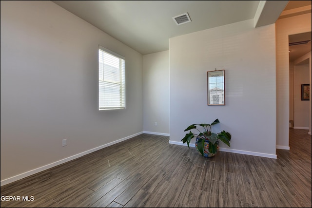 13162 Cleethorpes St, El Paso, TX 79928 - unfurnished room featuring dark wood-style flooring, visible vents, and baseboards