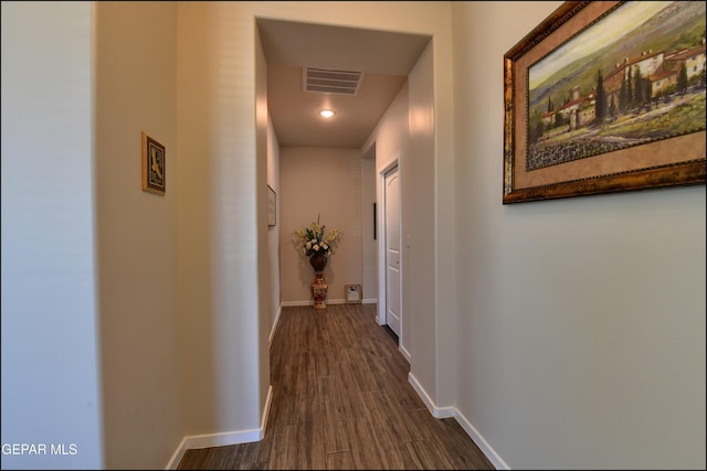13162 Cleethorpes St, El Paso, TX 79928 - hall featuring dark wood-style flooring, visible vents, and baseboards