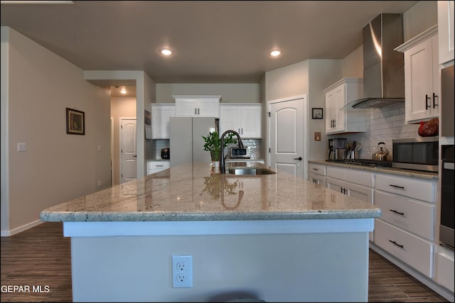 13162 Cleethorpes St, El Paso, TX 79928 - kitchen with a sink, appliances with stainless steel finishes, dark wood-style floors, a large island, and wall chimney exhaust hood