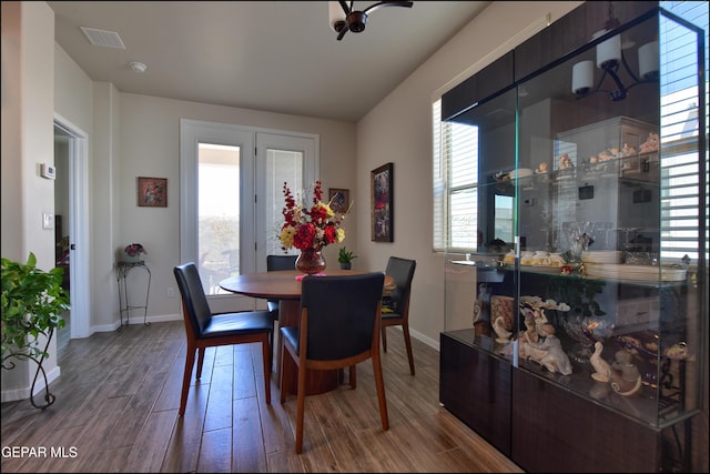 13162 Cleethorpes St, El Paso, TX 79928 - dining room featuring a wealth of natural light, wood finished floors, and baseboards