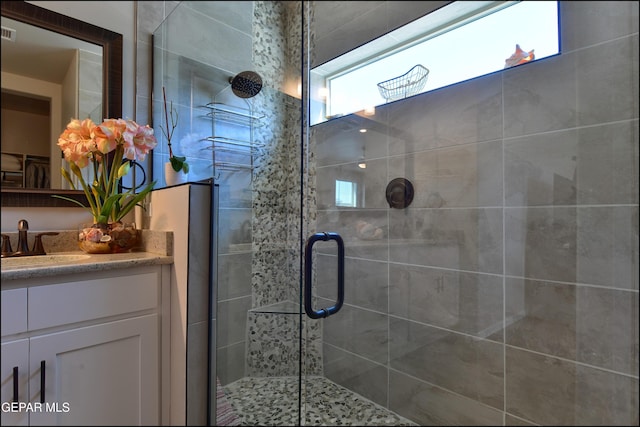 13162 Cleethorpes St, El Paso, TX 79928 - bathroom with visible vents, vanity, and a stall shower