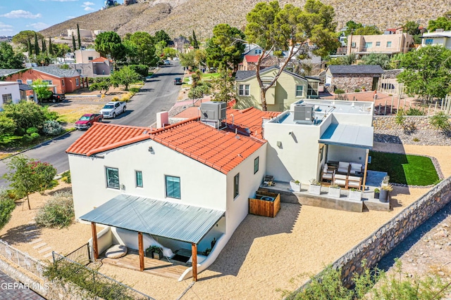 bird's eye view featuring a mountain view and a residential view