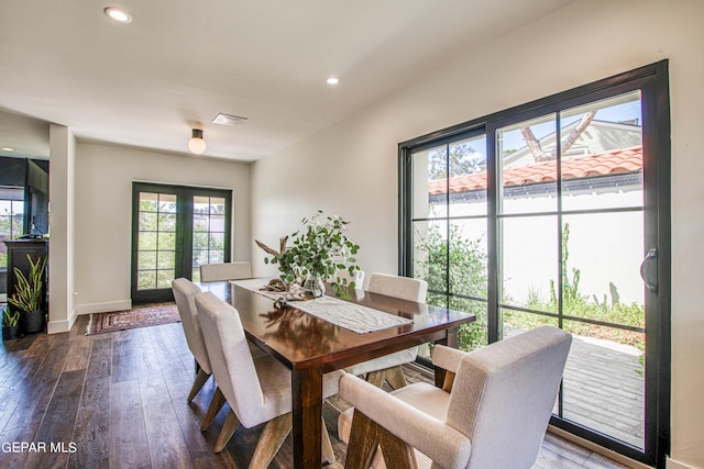 dining space featuring dark wood-type flooring, visible vents, recessed lighting, and baseboards