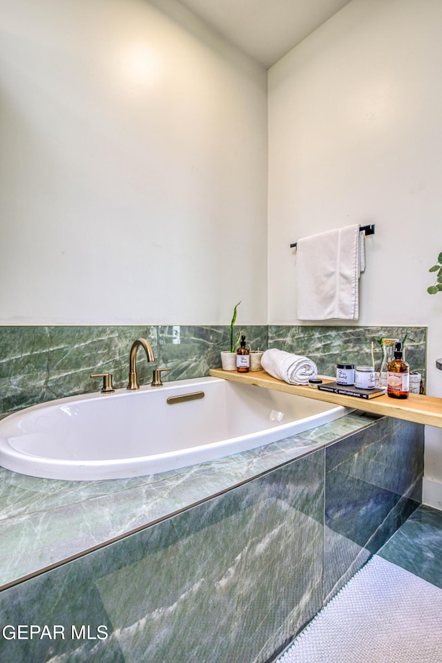 bathroom with a tub