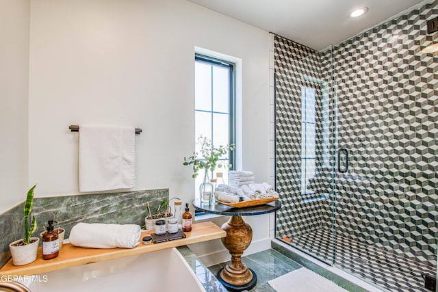 bathroom featuring a shower stall and recessed lighting