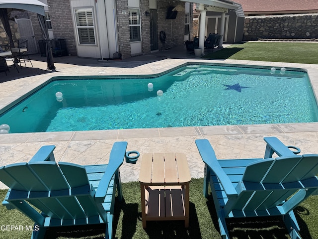 pool with a patio
