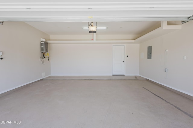 13145 Hazy, El Paso, TX 79938 - garage with electric panel, a garage door opener, and water heater