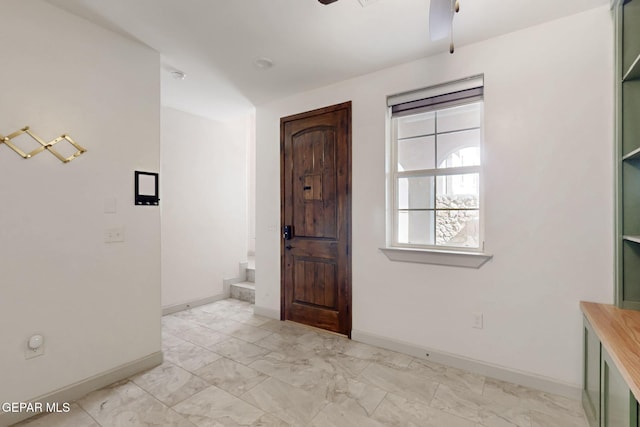337 Vin Almoradi Ct, El Paso, TX 79912 - foyer entrance featuring ceiling fan, marble finish floor, and baseboards