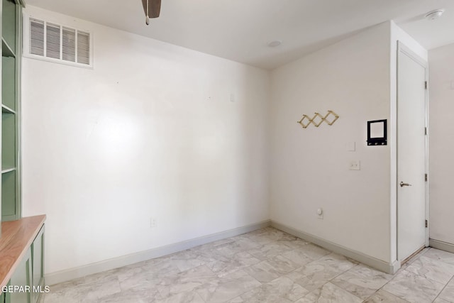 337 Vin Almoradi Ct, El Paso, TX 79912 - unfurnished room with marble finish floor, visible vents, a ceiling fan, and baseboards