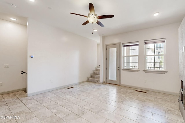 337 Vin Almoradi Ct, El Paso, TX 79912 - spare room featuring recessed lighting, ceiling fan, stairs, visible vents, and baseboards