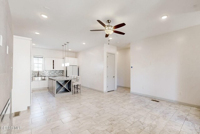 337 Vin Almoradi Ct, El Paso, TX 79912 - living room with visible vents, a ceiling fan, recessed lighting, and baseboards