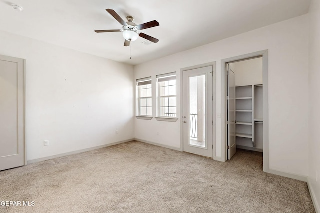 337 Vin Almoradi Ct, El Paso, TX 79912 - unfurnished bedroom featuring baseboards, a spacious closet, ceiling fan, and carpet flooring