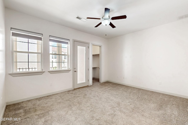 337 Vin Almoradi Ct, El Paso, TX 79912 - unfurnished bedroom featuring baseboards, visible vents, a spacious closet, and carpet