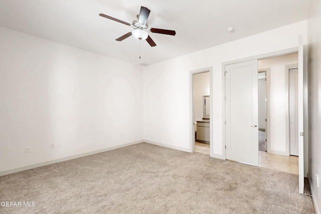 337 Vin Almoradi Ct, El Paso, TX 79912 - unfurnished bedroom featuring baseboards, a ceiling fan, ensuite bath, and carpet