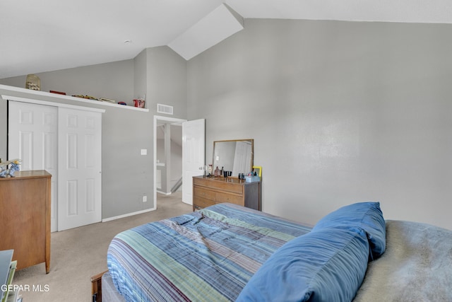 bedroom featuring visible vents, high vaulted ceiling, light colored carpet, and baseboards