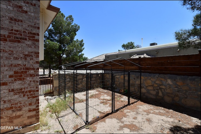 view of patio / terrace with an outbuilding and an exterior structure