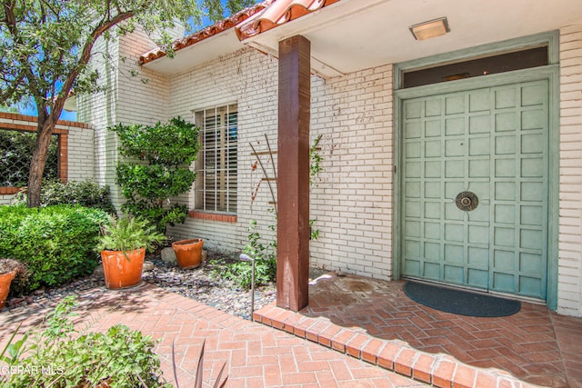 6041 Torrey Pines Dr, El Paso, TX 79912 - property entrance featuring brick siding
