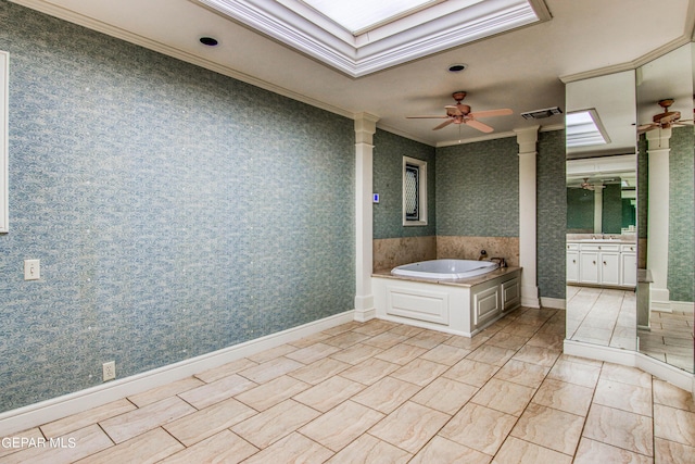 6041 Torrey Pines Dr, El Paso, TX 79912 - full bath with decorative columns, ornamental molding, visible vents, a ceiling fan, and a garden tub