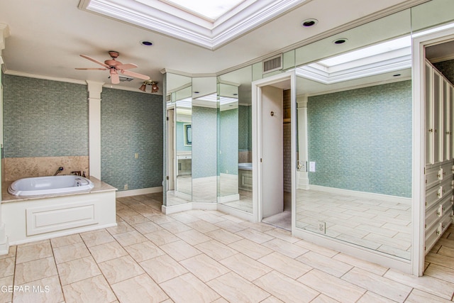 6041 Torrey Pines Dr, El Paso, TX 79912 - full bath featuring a bath, a ceiling fan, wallpapered walls, and crown molding