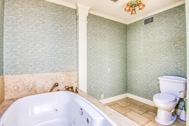 6041 Torrey Pines Dr, El Paso, TX 79912 - bathroom featuring toilet, a whirlpool tub, visible vents, and ornamental molding