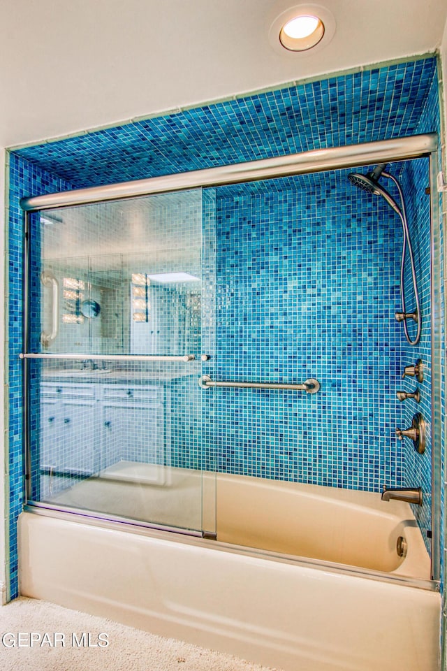 6041 Torrey Pines Dr, El Paso, TX 79912 - bathroom with shower / bath combination with glass door