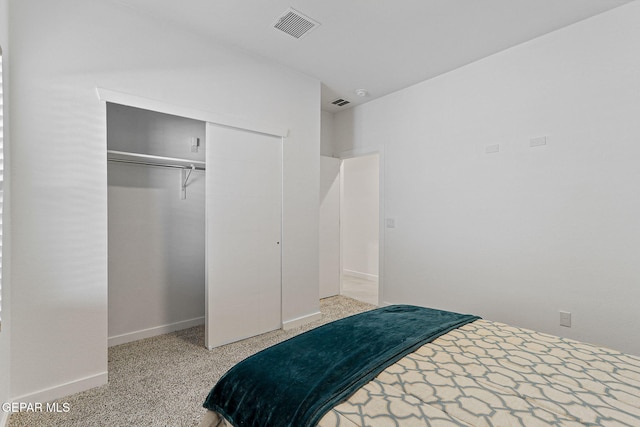 1725 Eased St, El Paso, TX 79928 - bedroom with baseboards, visible vents, speckled floor, and a closet
