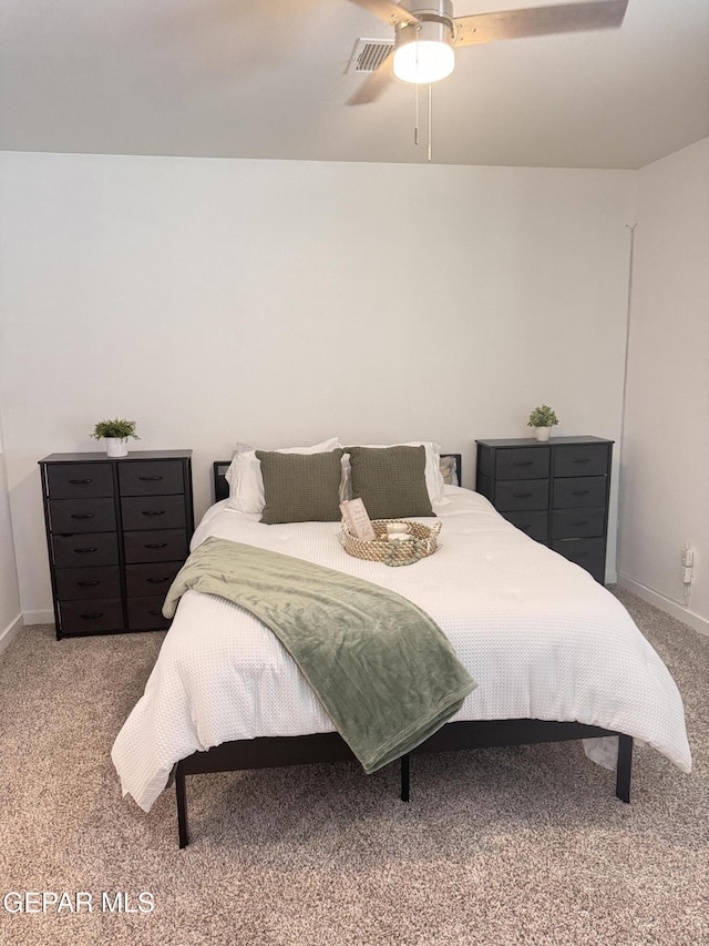 1725 Eased St, El Paso, TX 79928 - carpeted bedroom featuring a ceiling fan, visible vents, and baseboards