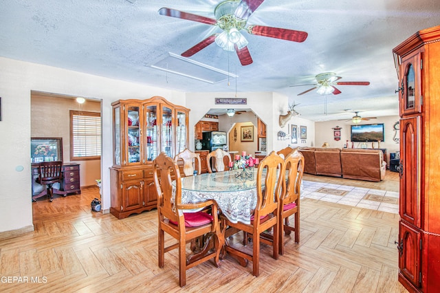916 Mike Maros St, Fabens, TX 79838 - dining area featuring attic access, a textured ceiling, and ceiling fan