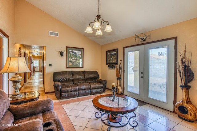 916 Mike Maros St, Fabens, TX 79838 - living room featuring light tile patterned floors, visible vents, a chandelier, french doors, and high vaulted ceiling