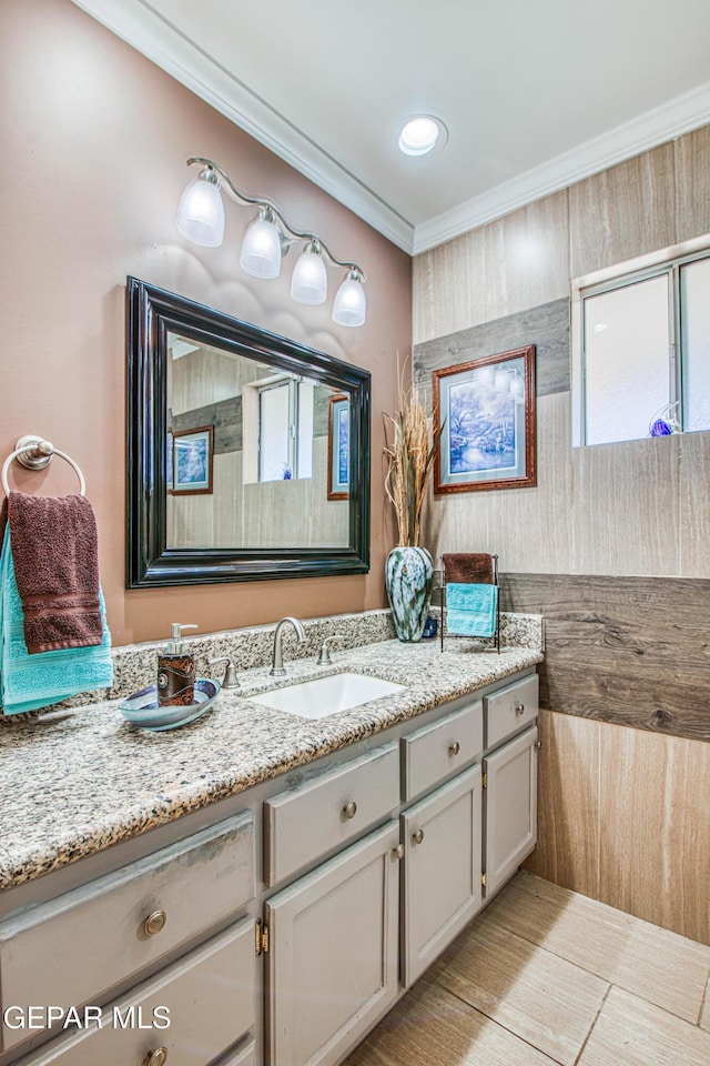 916 Mike Maros St, Fabens, TX 79838 - bathroom with a healthy amount of sunlight, crown molding, and vanity