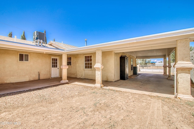 916 Mike Maros St, Fabens, TX 79838 - exterior space featuring a patio, fence, stucco siding, and central air condition unit