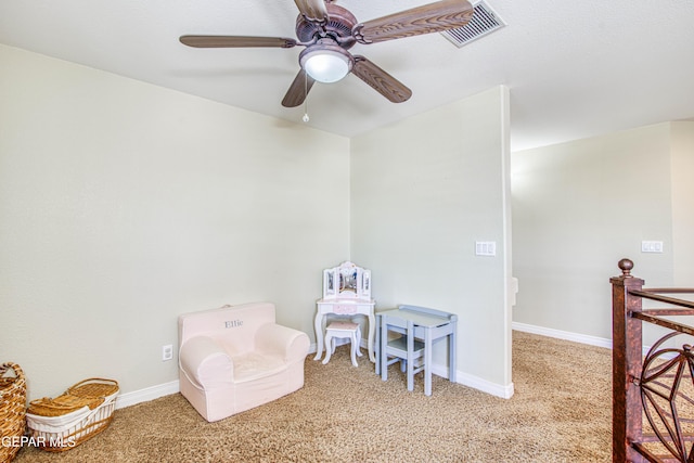 playroom with visible vents, baseboards, ceiling fan, and light carpet