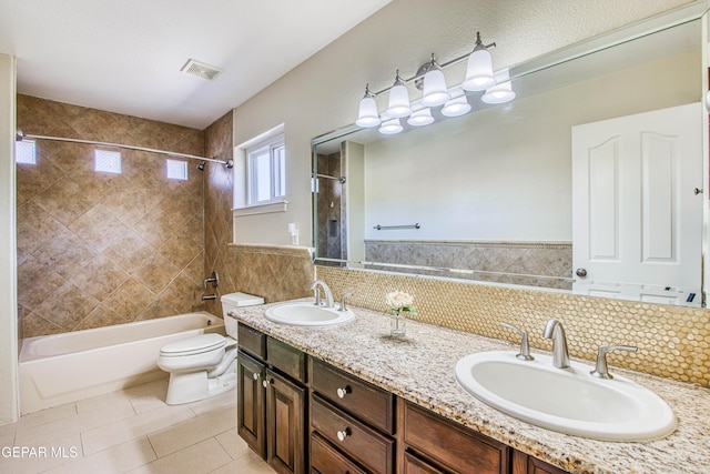 full bath featuring a sink, tile patterned floors, toilet, and visible vents