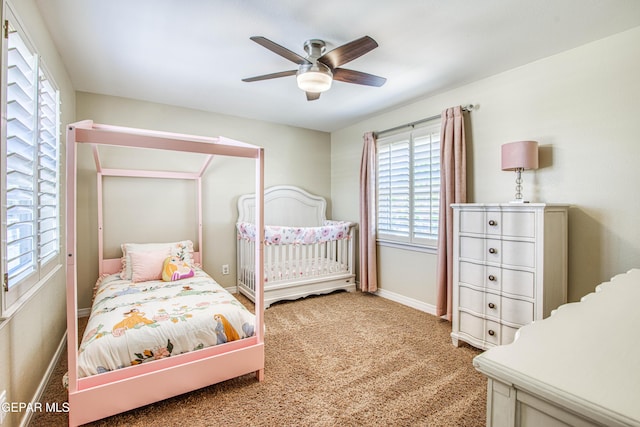 bedroom featuring baseboards, carpet, and a ceiling fan