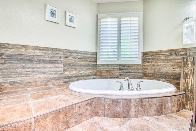 full bath featuring a bath