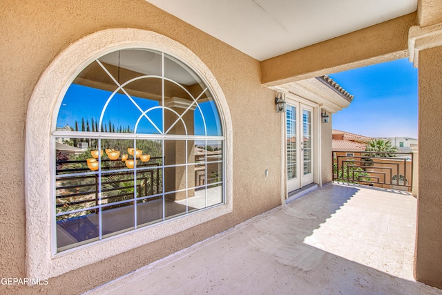 view of patio / terrace with a balcony