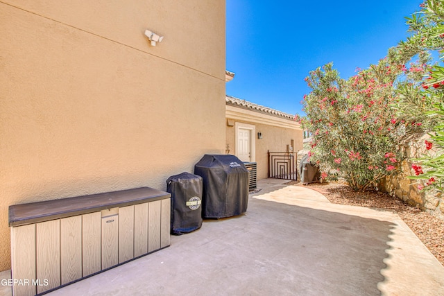 view of patio featuring central AC unit