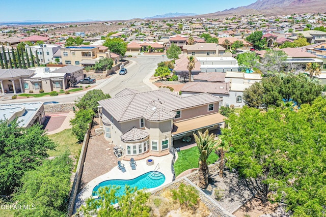 aerial view featuring a mountain view and a residential view