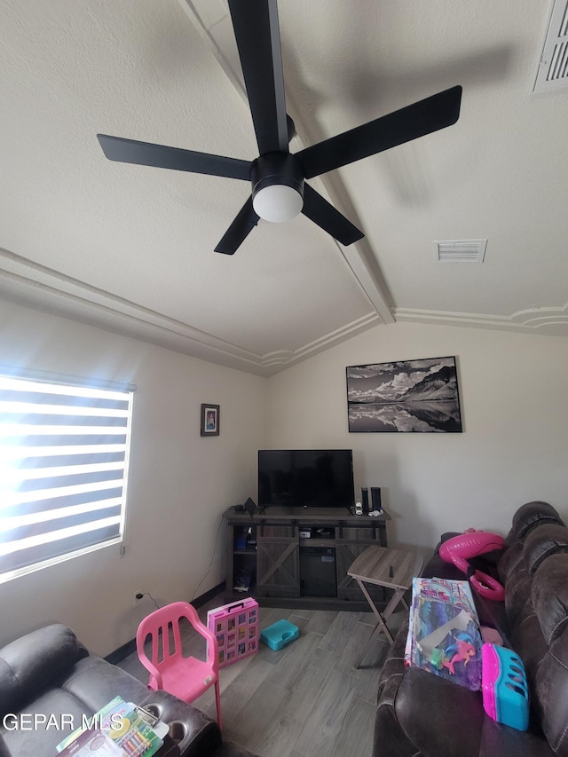11531 Ernest Rd, Socorro, TX 79927 - living room featuring a ceiling fan and wood finished floors