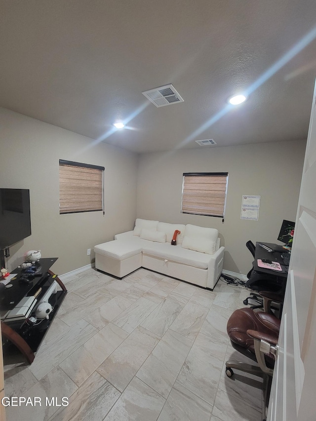 11531 Ernest Rd, Socorro, TX 79927 - living area featuring baseboards, recessed lighting, and light marble finish floors
