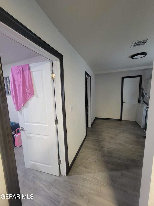 11531 Ernest Rd, Socorro, TX 79927 - hall featuring wood finished floors and baseboards