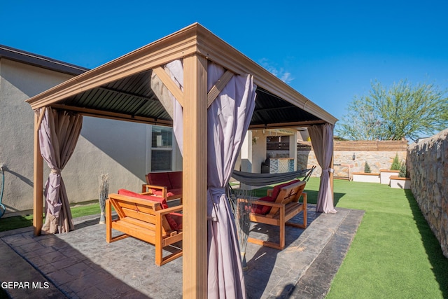 12244 Desert Snow Ct, El Paso, TX 79938 - view of patio / terrace with a gazebo, exterior bar, and fence