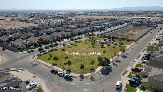 bird's eye view with a residential view and a mountain view